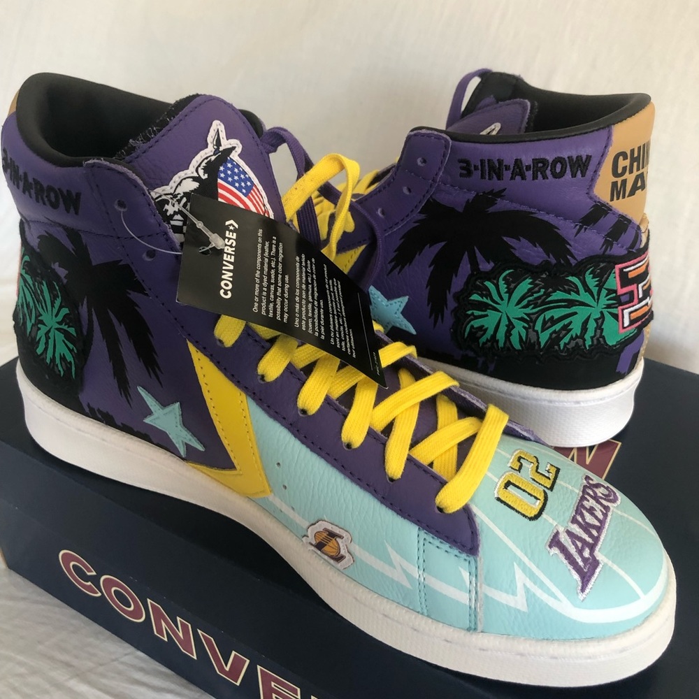 Lakers leather Converse by Chinatown Market shoes.